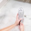 Sprchová hlavice/stimulátor klitorisu Wave (Womanizer)