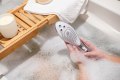 Sprchová hlavice/stimulátor klitorisu Wave (Womanizer)